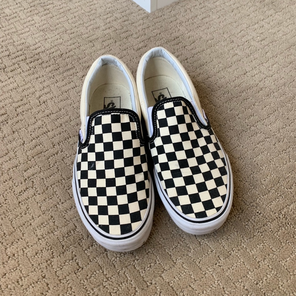 Checkerboard slip-on vans